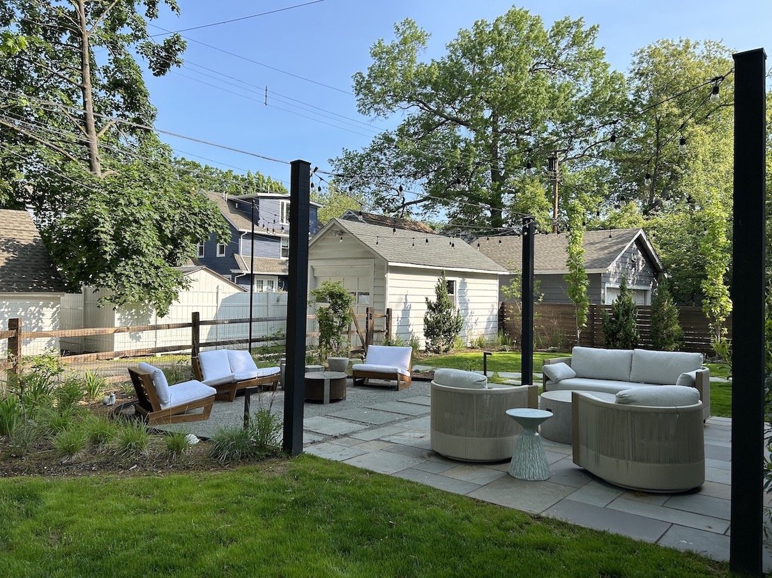 Natural stone patio with italian hang lights in NJ home.jpg