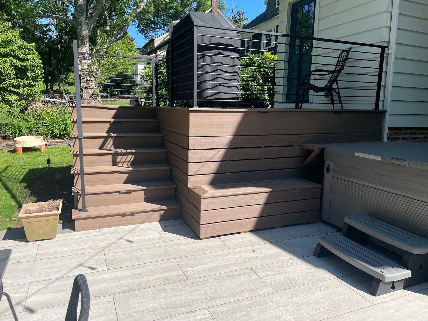 Natural looking wood deck with black accents for northern nj home.jpg